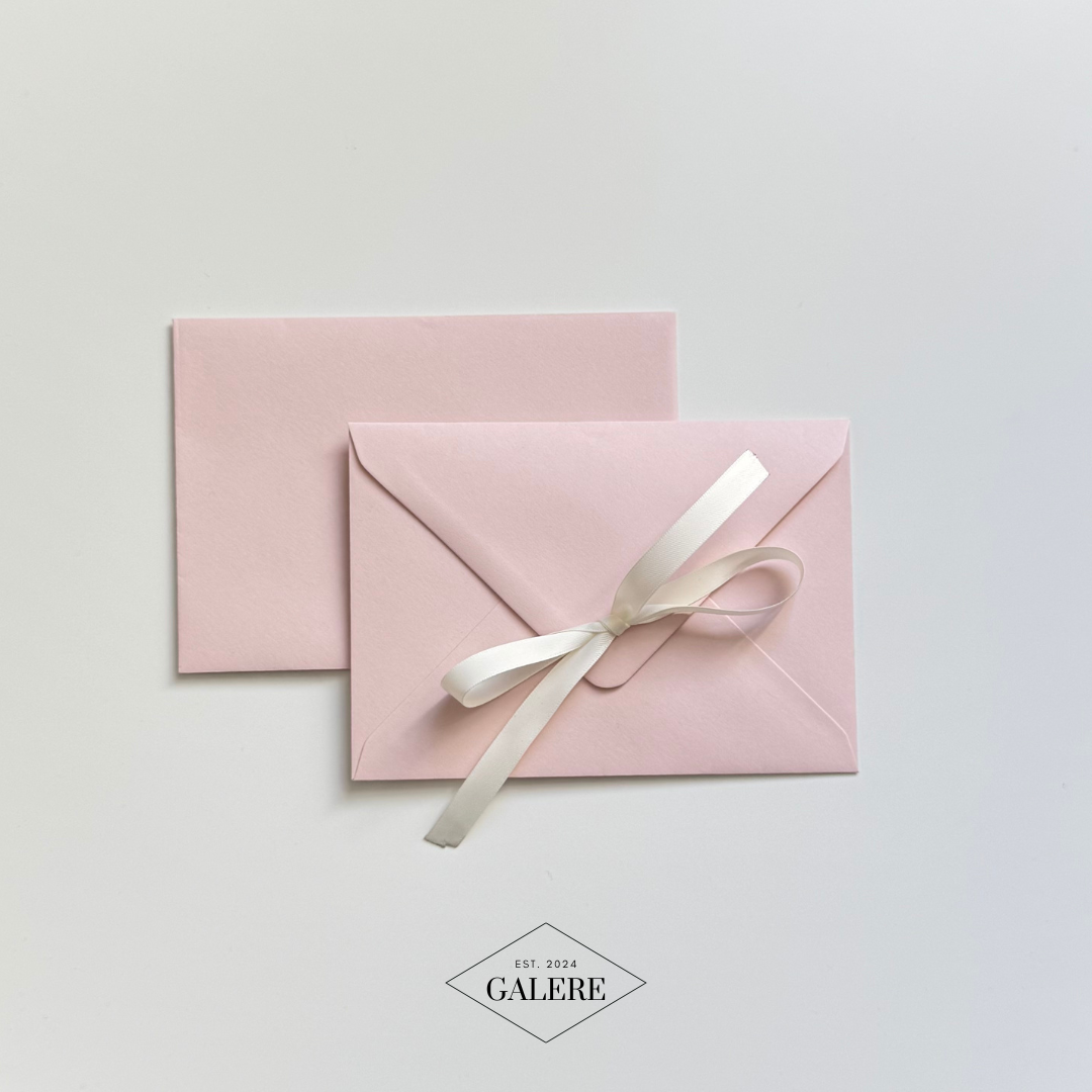 Pale Pink Envelopes with White Ribbon